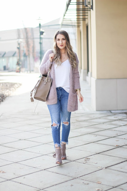 women wearing light purple cardigans sweater
