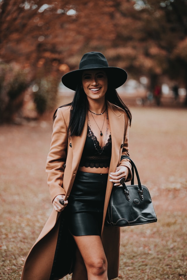 Woman carrying a black bag