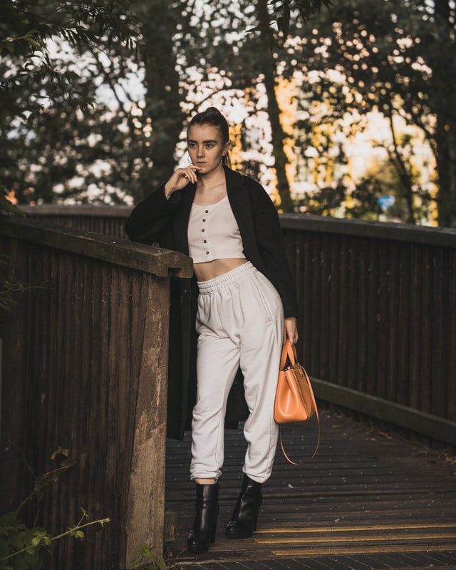 a fashion women with a handbag